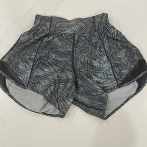 Lululemon, well-worn, small bleach spot on bottom right side